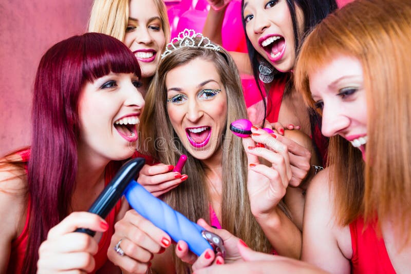 Women having bachelorette party with sex toys in night club royalty free stock photo Women having bachelorette party with sex toys in night club royalty free stock photo