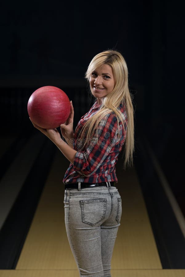 Women Holding a Bowling Ball Stock Image Image of cheerful, ball