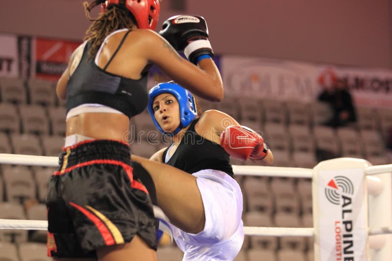 Women kickboxing editorial photo