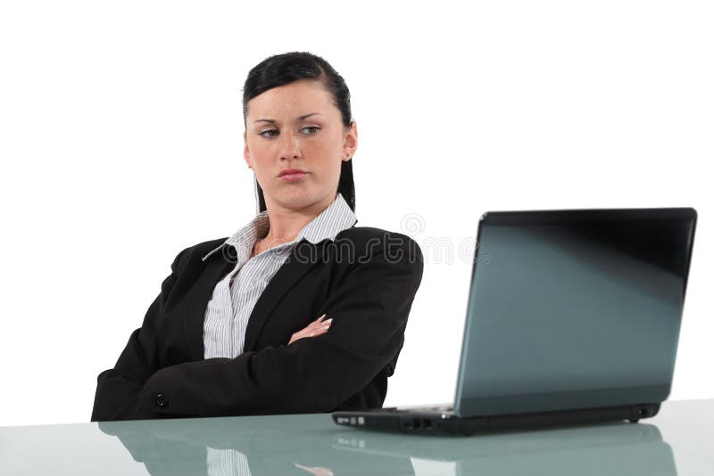 Women looking disgruntled computer