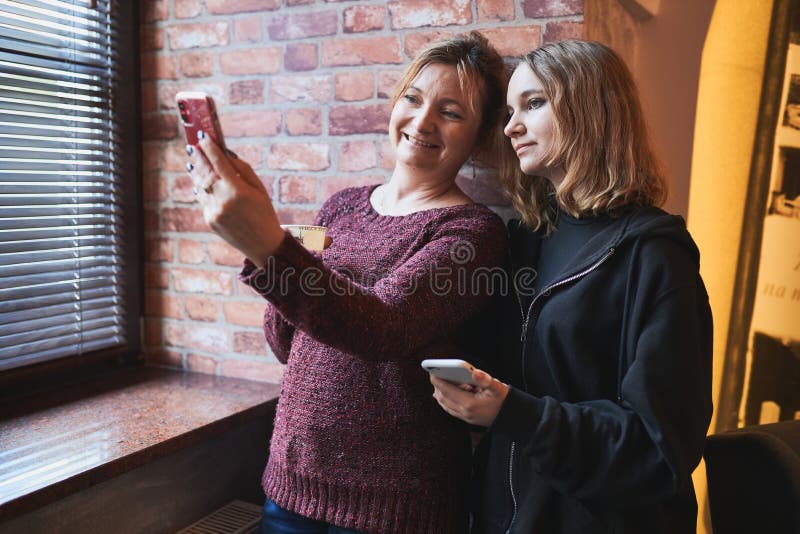 Women Making Video Call On Mobile Phone Taking Selfie Photo Using Smartphone Stock Image