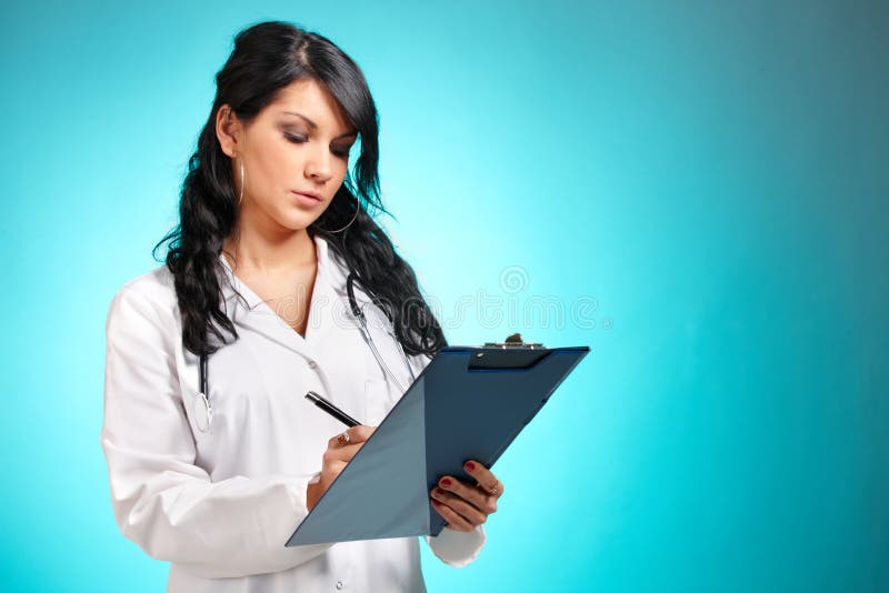 Women medicine doctor with pen and notepad