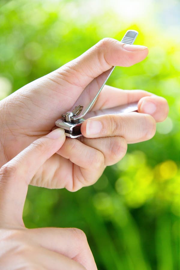 Women with nail clipper