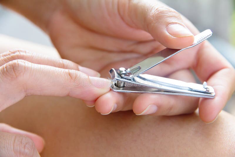 Women with nail clipper