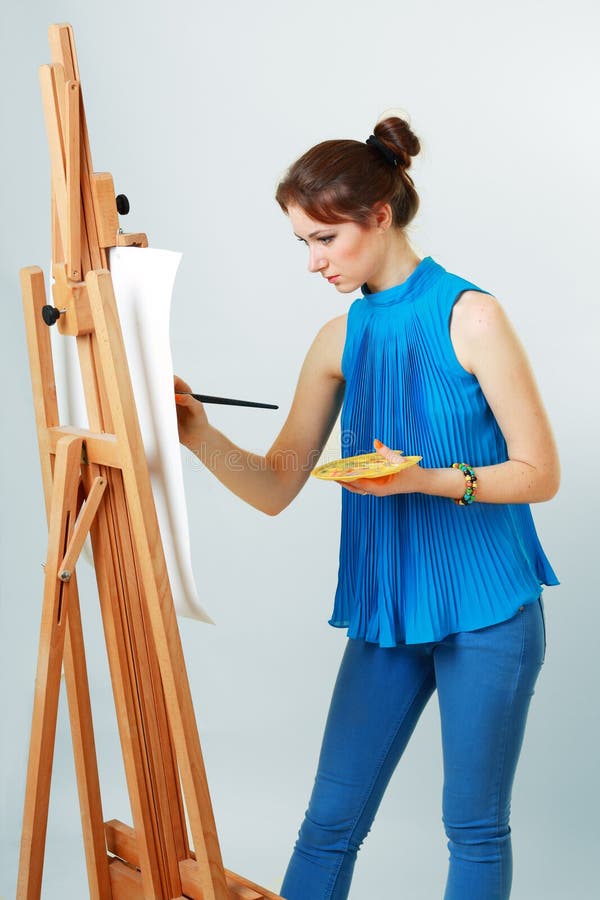 Women painter with easel stock image. Image of attractive 