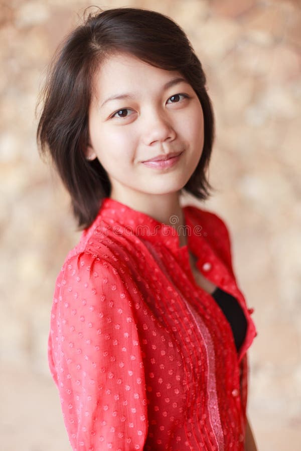 Women in red shirt with smile face