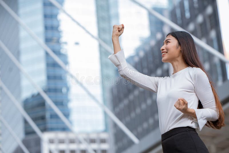 Women rise her hand for business winner success royalty free stock photo Women rise her hand for business winner success royalty free stock photo