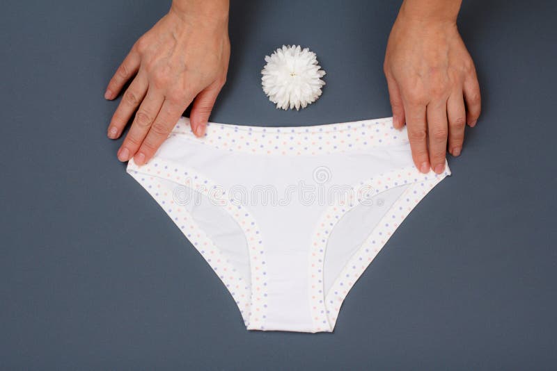 Women`s Hands with Beautiful Panties on Gray Background Stock Photo ...
