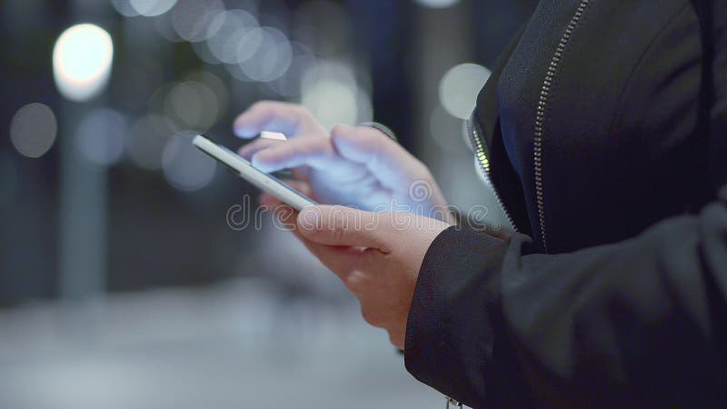 Women`s hands holding cell phone. stock video footage