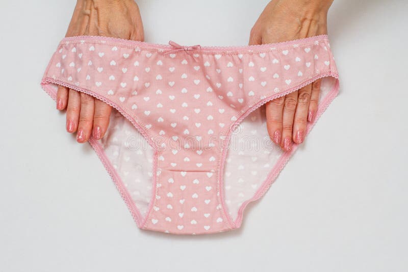 Women& X27;s Hands with Beautiful Panties on Pink Background Stock ...