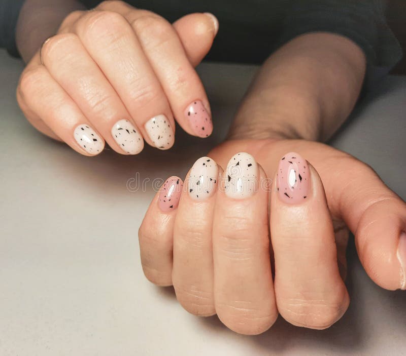 Women`s Hands with Pale Pink Gel Polish and Black Fragments on Nails. Stock  Photo - Image of geometrical, abstract: 247533454