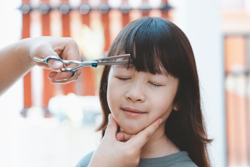 142 Child Girl Asian Bangs Stock Photos - Free & Royalty-Free Stock Photos  from Dreamstime