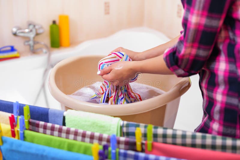 Women`s Hands Wash Clothes in the Basin. Stock Image Image of colour