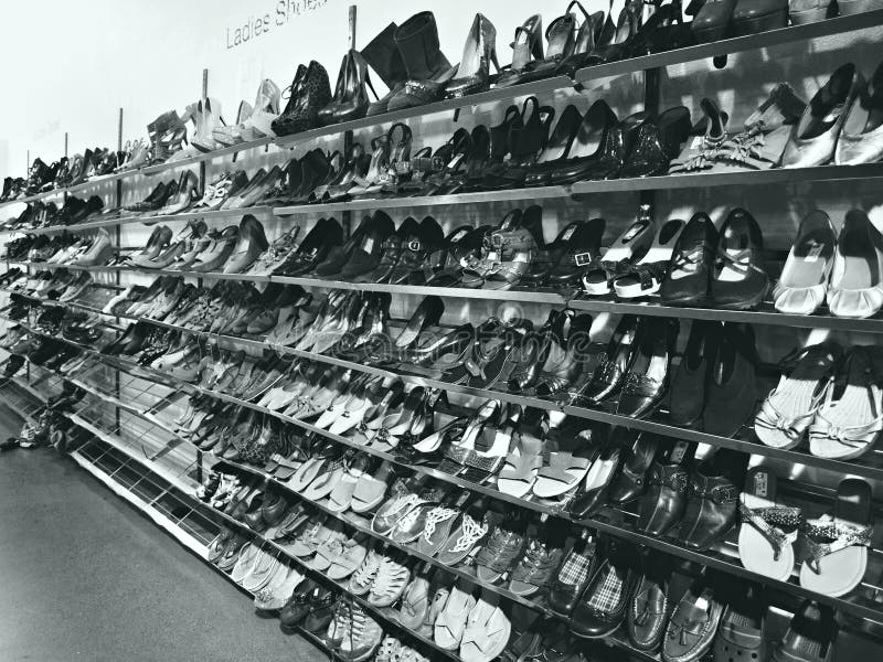 Women`s Used Shoes on Thrift Store Racks, Photographed in Black and ...