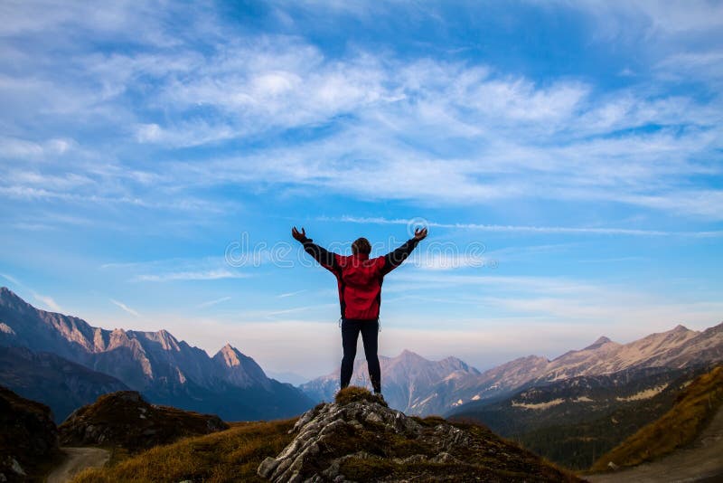 Women silhouette on the top of mountain