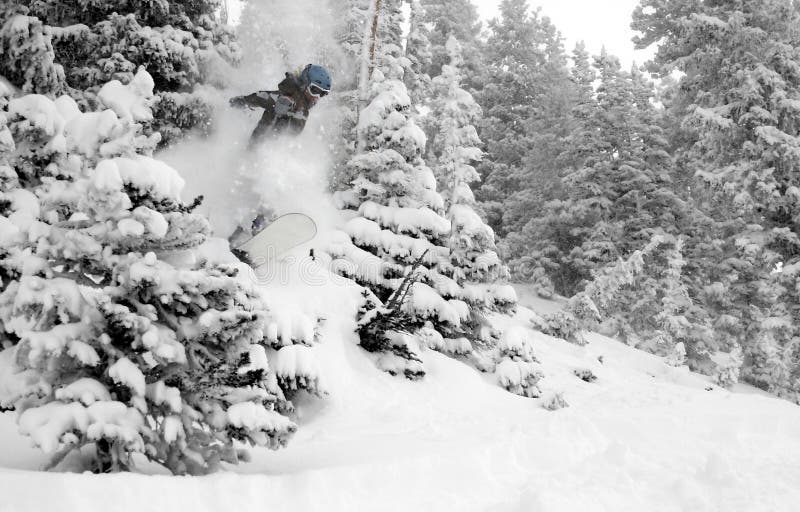 Women snow boarder hits jump 3 in action