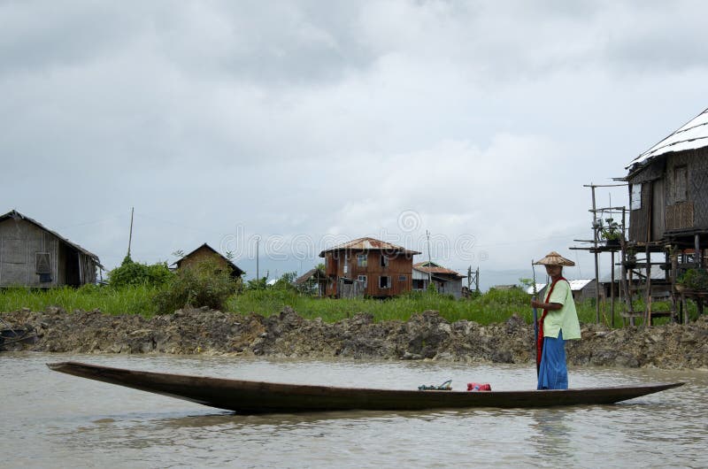 Women taking the boat to the market royalty free stock photo
