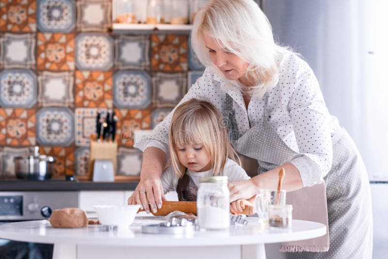 Mom Teaches Her Little Daughter To Cook Food Stock Image Image Of