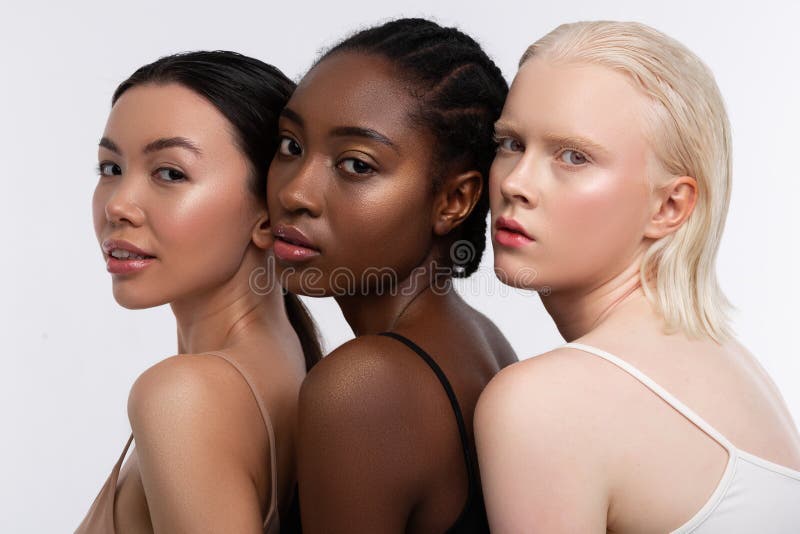 Women with Three Shades of Skin Color Having Open Shoulders Stock Photo -  Image of understanding, posing: 144724722