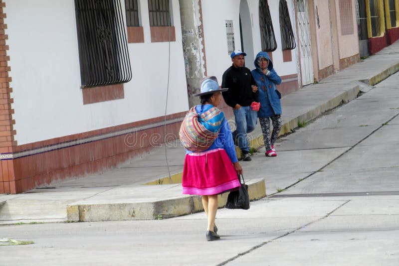 Women in traditional peruvian clothes and hats on the streets of Cuzco city royalty free stock photo Women in traditional peruvian clothes and hats on the streets of Cuzco city royalty free stock photo