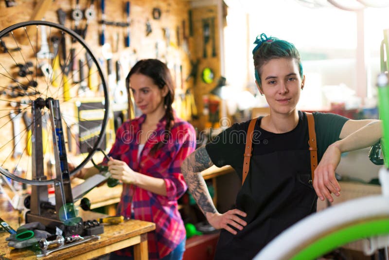 Women working in a bicycle repair shop