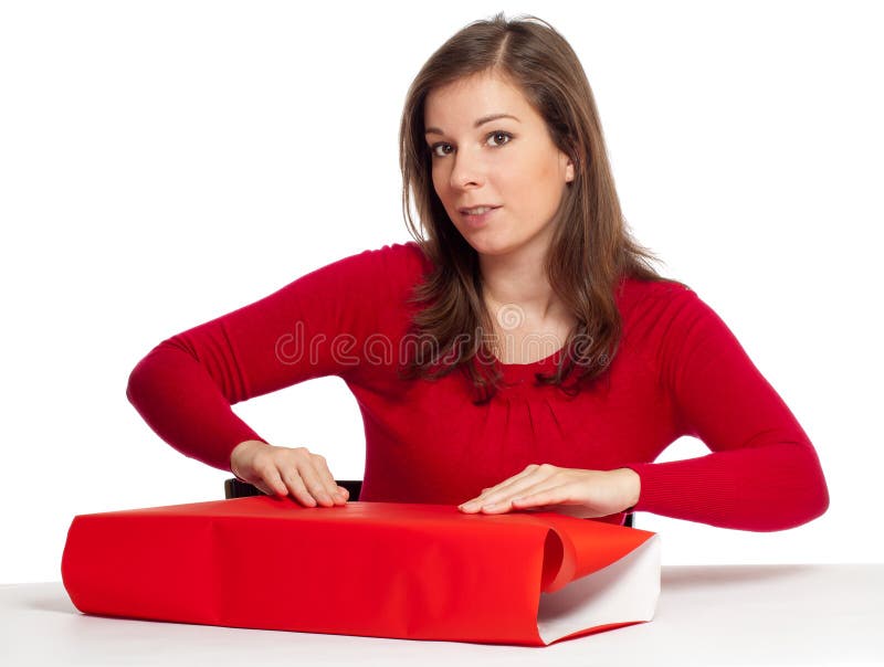 Women wrapping gift box