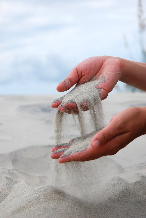 Womens hands with sand stock image. Image of atlantic 9758183