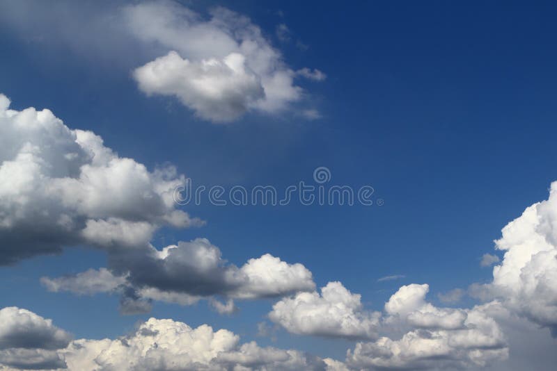 Wonderful colorful cumulus cloudy sky for using in design as background stock image