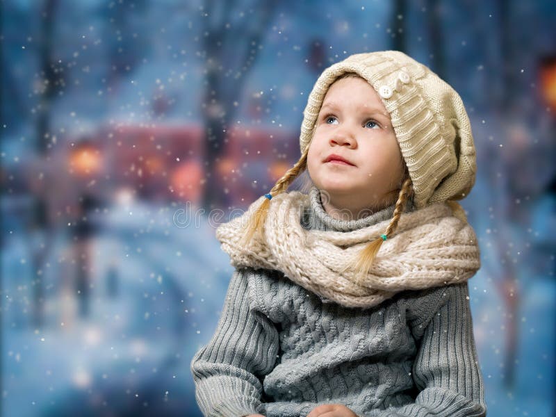 Wonderful Little Girl Looks at the Falling Snowflakes, Snow. Stock ...