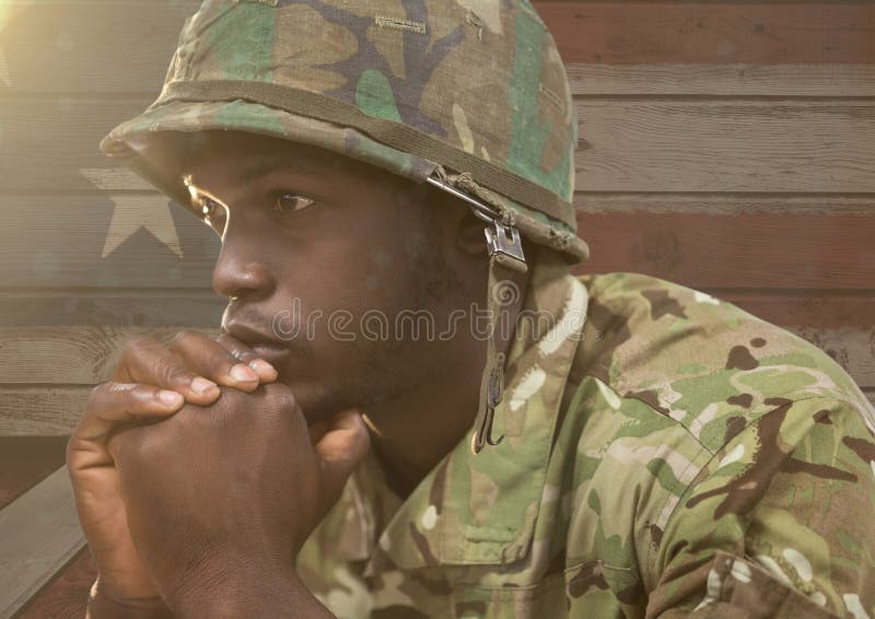 Wondering soldier against a wooden american flag background stock photos Wondering soldier against a wooden american flag background stock photos