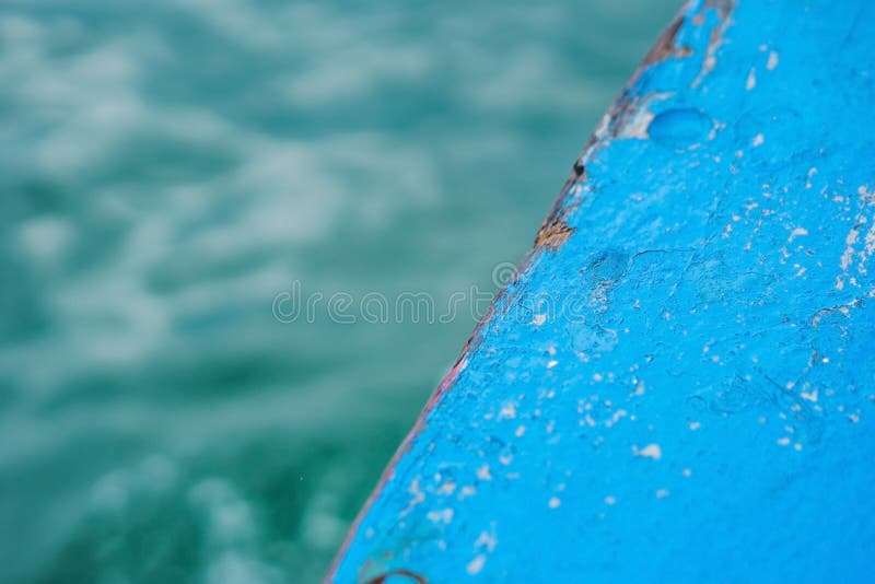 Wood with blue paint and sea stock photos Wood with blue paint and sea stock photos