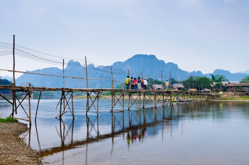 Wood bridge over river song, Vang vieng, Laos royalty free stock photos