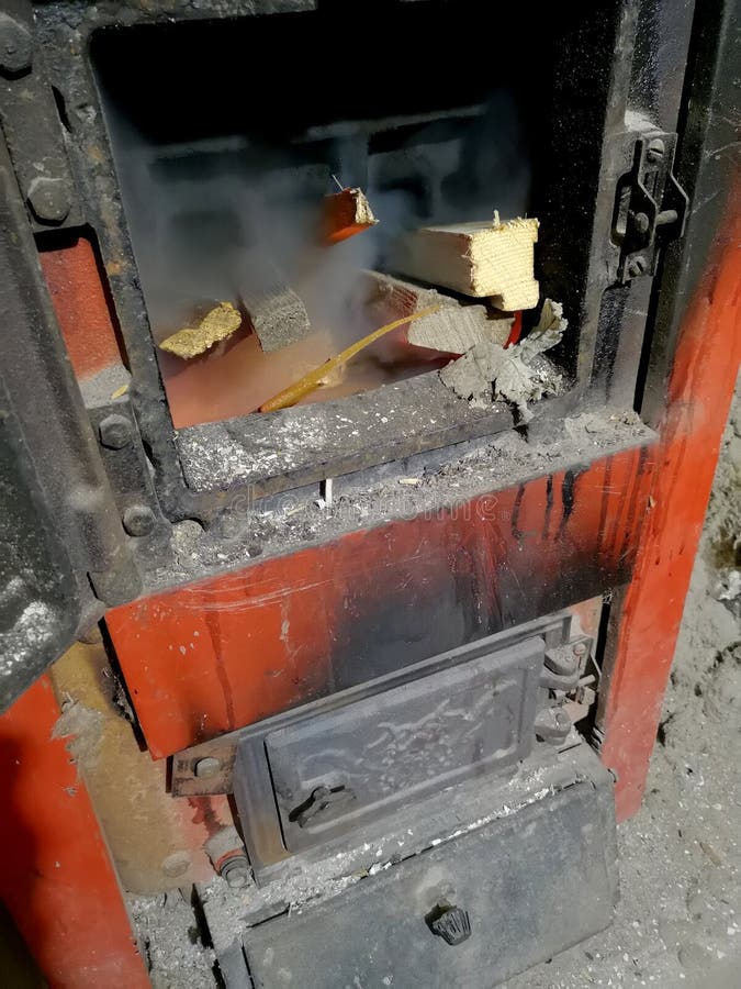 Wood Burning Inside the Solid Bio Fuel Boiler. Renewable Source of