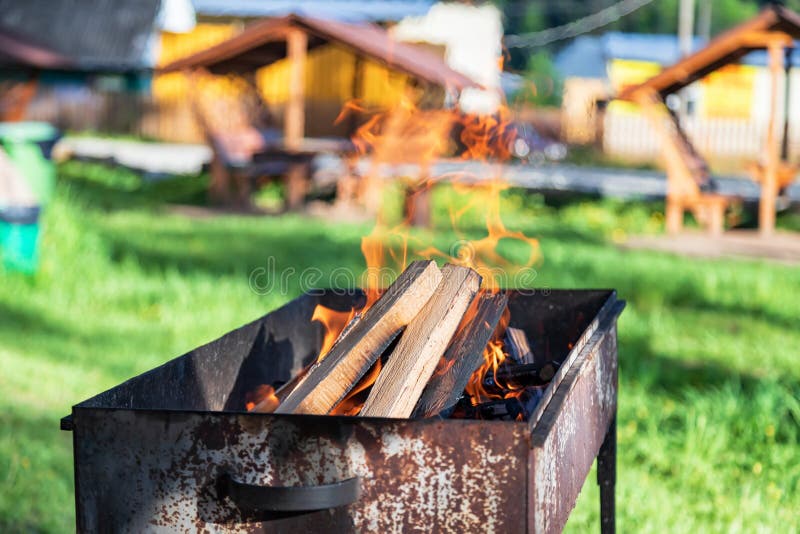 Wood Burning in an Old Rusty Grill Stock Photo Image of firewood