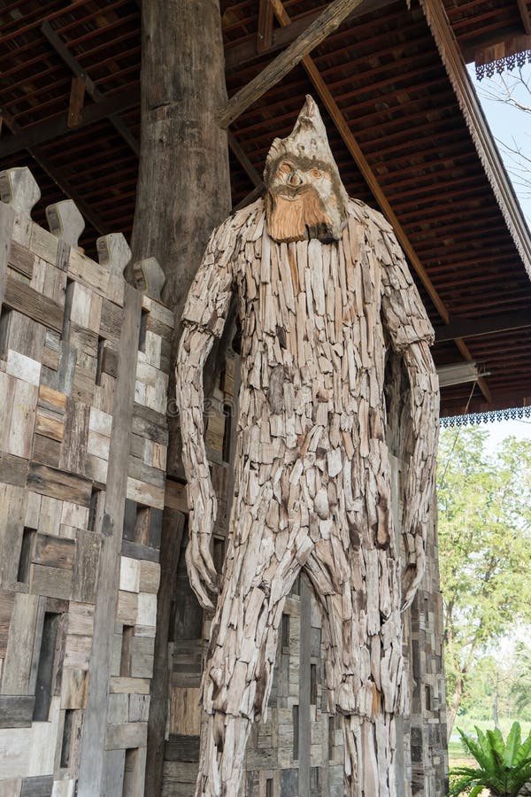 Wood carving human faces stock photo. Image of symbol 66502410