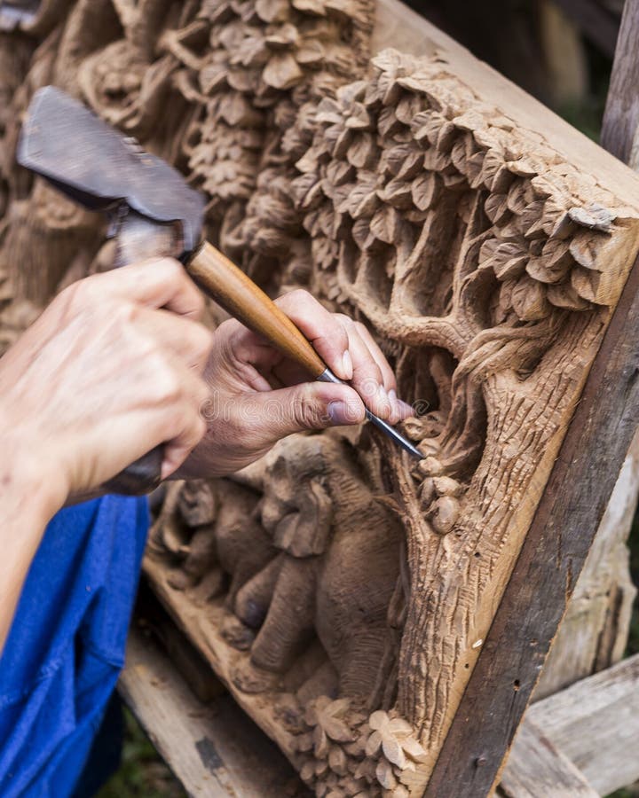Wood carving work editorial stock image. Image of lumber 107538674