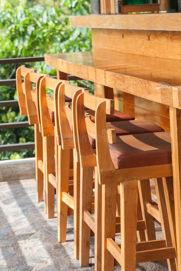Wood chairs and bar stock image. Image of hardwood, coffee 45637413