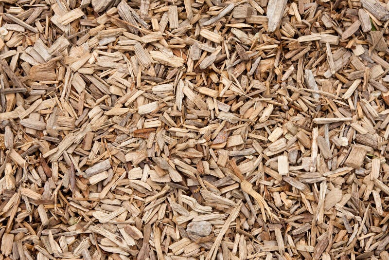 Wood Chips Pellets Chopped Wooden Logs and Stacked Wooden Pallets for