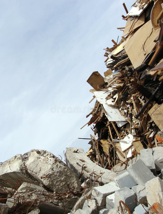 Wood,concrete rubble and twisted metal skyline on a demolition s