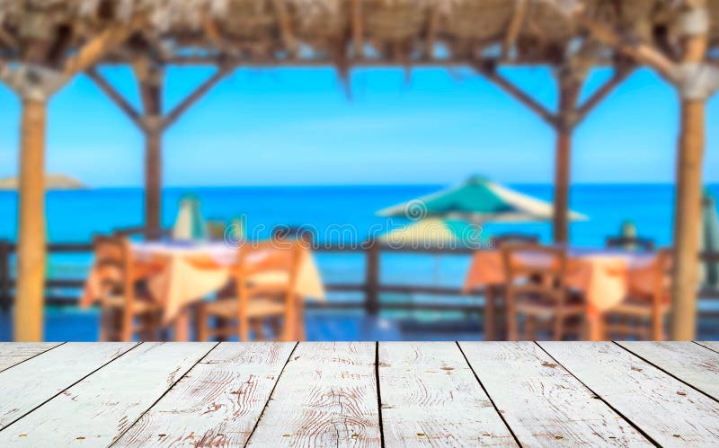 Wood deck in front of beach landscape