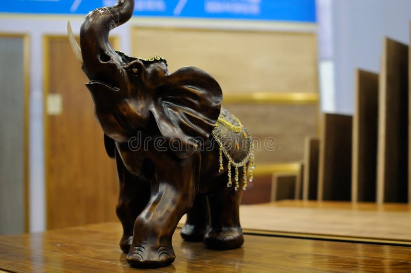 Wood elephant on table stock photo. Image of handicraft 30591380