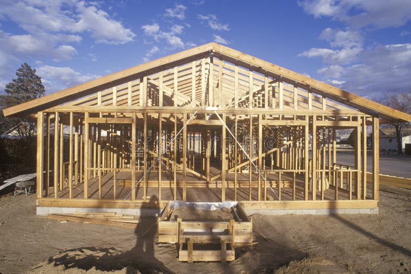 Wood frame of house under construction, Lone Pine, CA stock photo Wood frame of house under construction, Lone Pine, CA stock photo