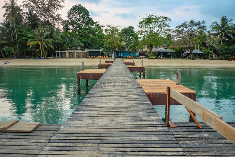 Wood harbor boat dock in the morning