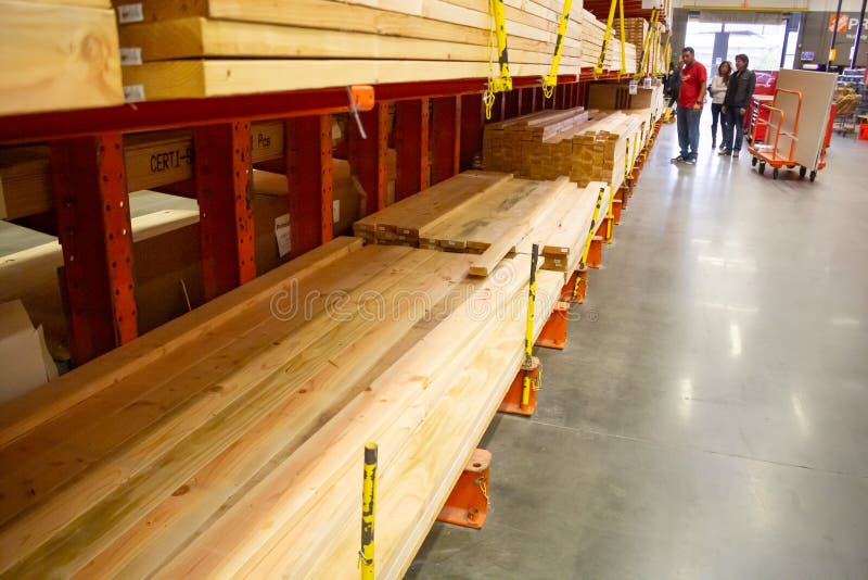 The Wood Aisle at Lowes Home Improvement Store with Stacks of Lumber