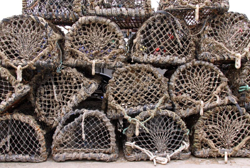 Wood and net crab and lobster pots / traps royalty free stock photos