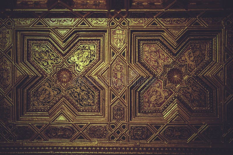 Wood paneling covered with gold leaf