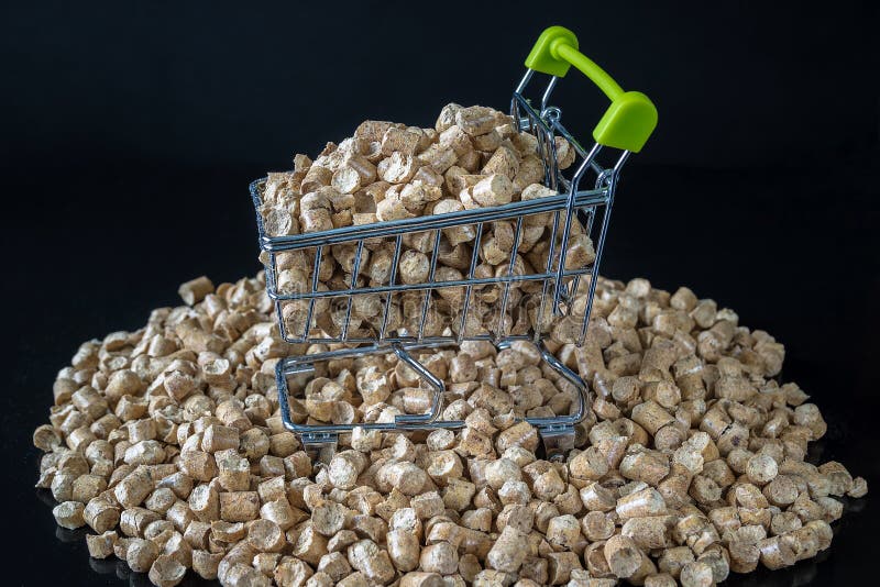 Wood Pellets On A Wooden Background. Biofuels. Cat Litter. Stock Image