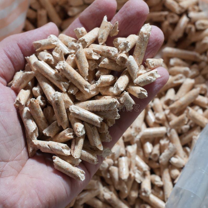 Wood pellets for heating stock image. Image of cylinder 103699033