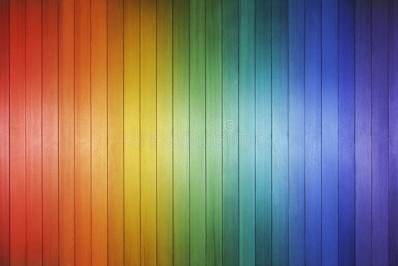 A wood background made with the colours of the rainbow. A wood background made with the colours of the rainbow.