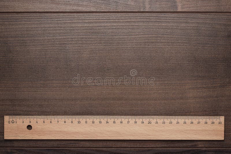 https://thumbs.dreamstime.com/b/wood-ruler-wooden-background-brown-32237538.jpg